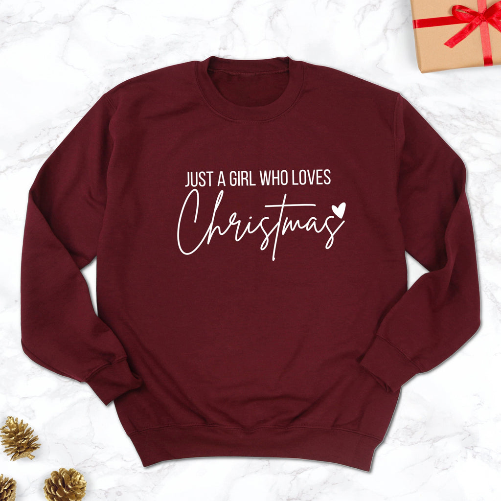 Just a Girl Who Loves Christmas Burgundy Sweatshirt - Express Delivery Available At Betty Bramble